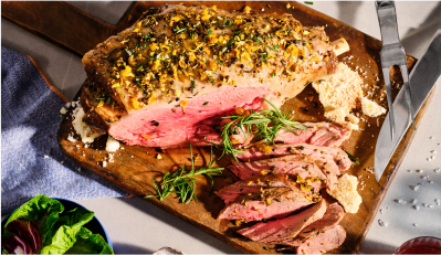 A medium rare leg of lamb.