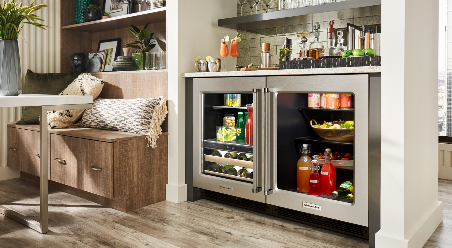 Undercounter refrigerator and beverage center beneath a countertop bar Undercounter refrigerator and beverage center beneath a countertop bar