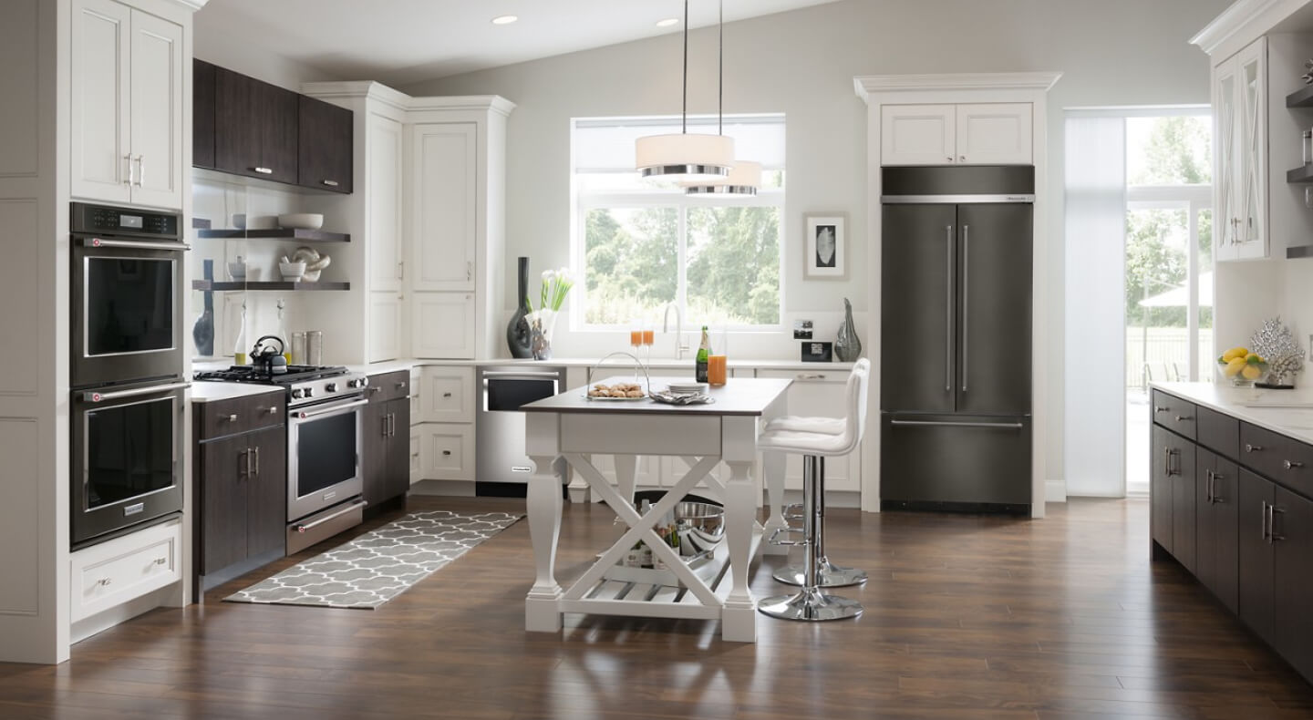 Modern kitchen with black stainless and stainless steel KitchenAid® appliances