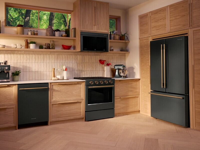 Suite of KitchenAid® Juniper appliances in wood cabinetry