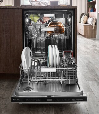 Open dishwasher filled with dishes