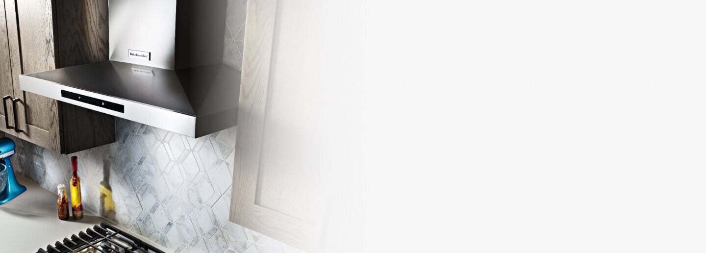 KitchenAid® kitchen hood over a gas cooktop