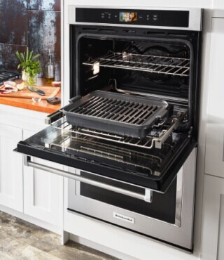 A double wall oven with the top open