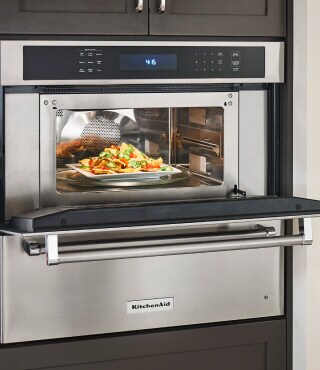 Built-in oven with a casserole dish inside