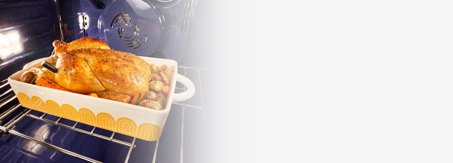 Chicken roasting in an oven