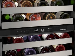 Wine refrigerator filled with bottles of wine