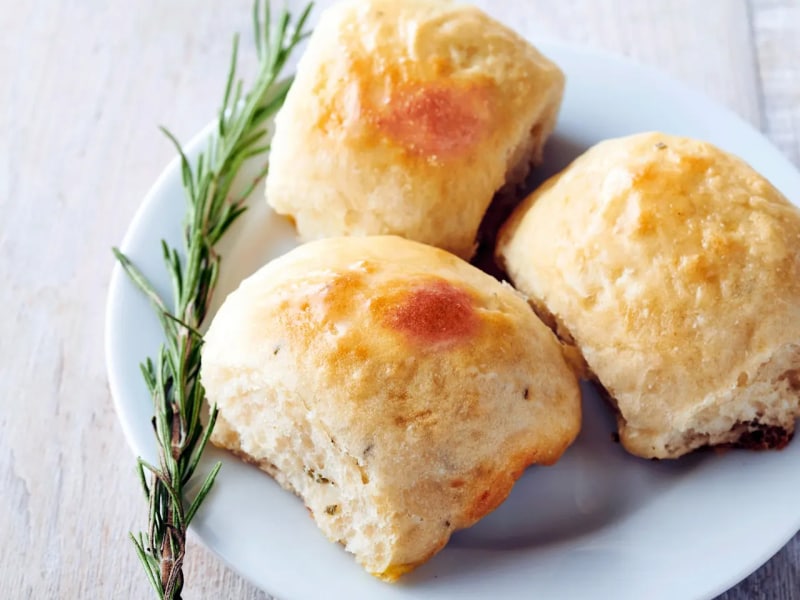 Potato rolls with sprig of rosemary