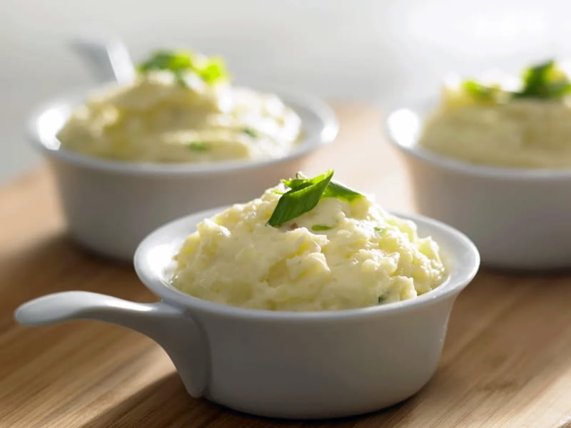 Mashed potatoes in white ramekins