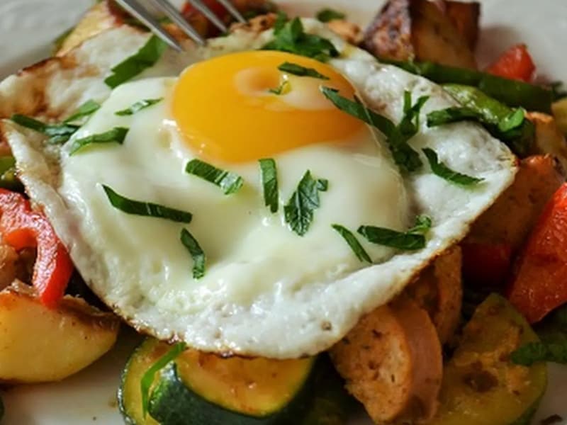 Veggie hash with sunny side up egg