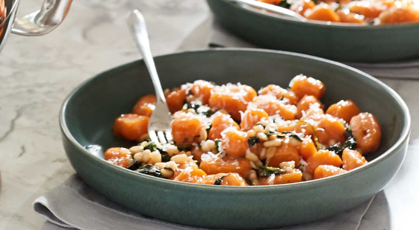 Potato gnocchi in blue bowl  Potato gnocchi in blue bowl
