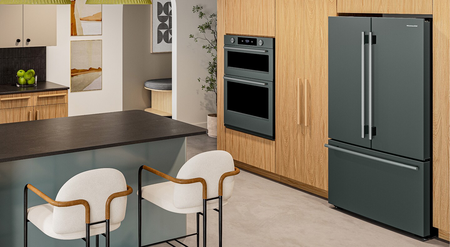 A juniper finish KitchenAid® French door refrigerator in a kitchen with light wood cabinetry