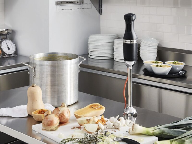 Commercial immersion blender on metal countertop Commercial immersion blender on metal countertop