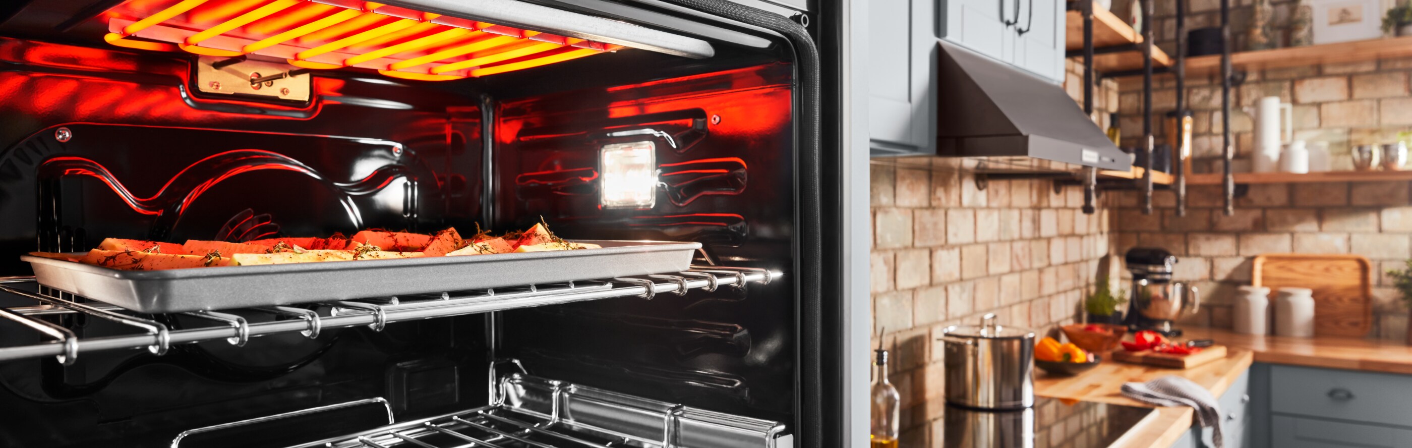 An oven with a tray of food inside of it