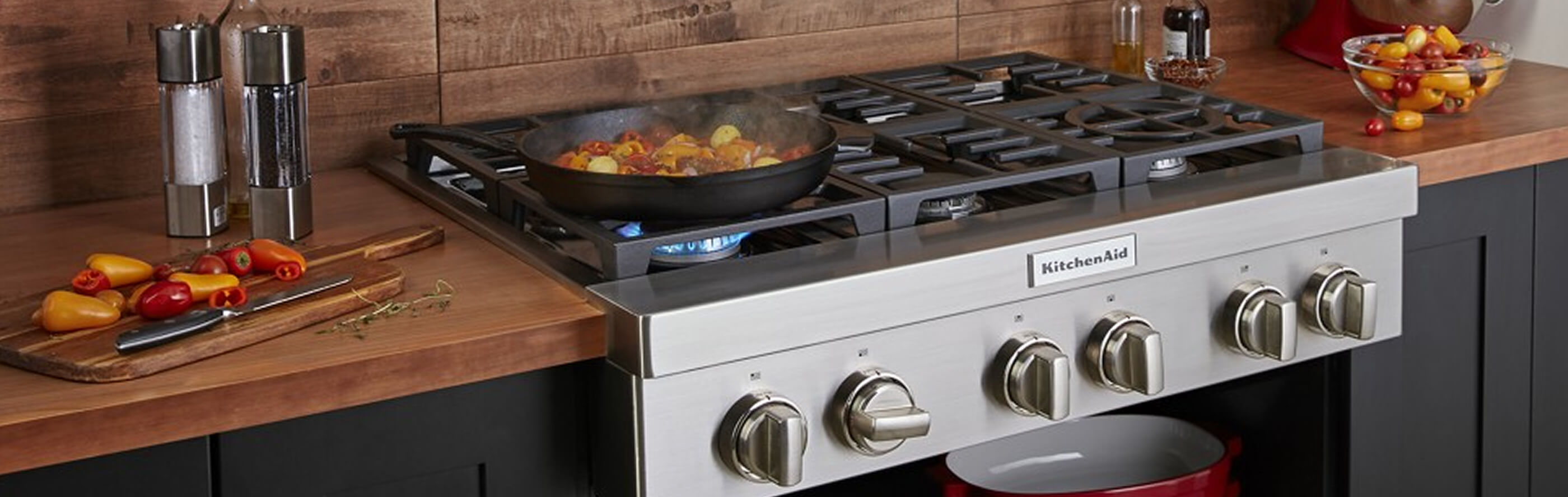 A dish cooking on a KitchenAid® cooktop