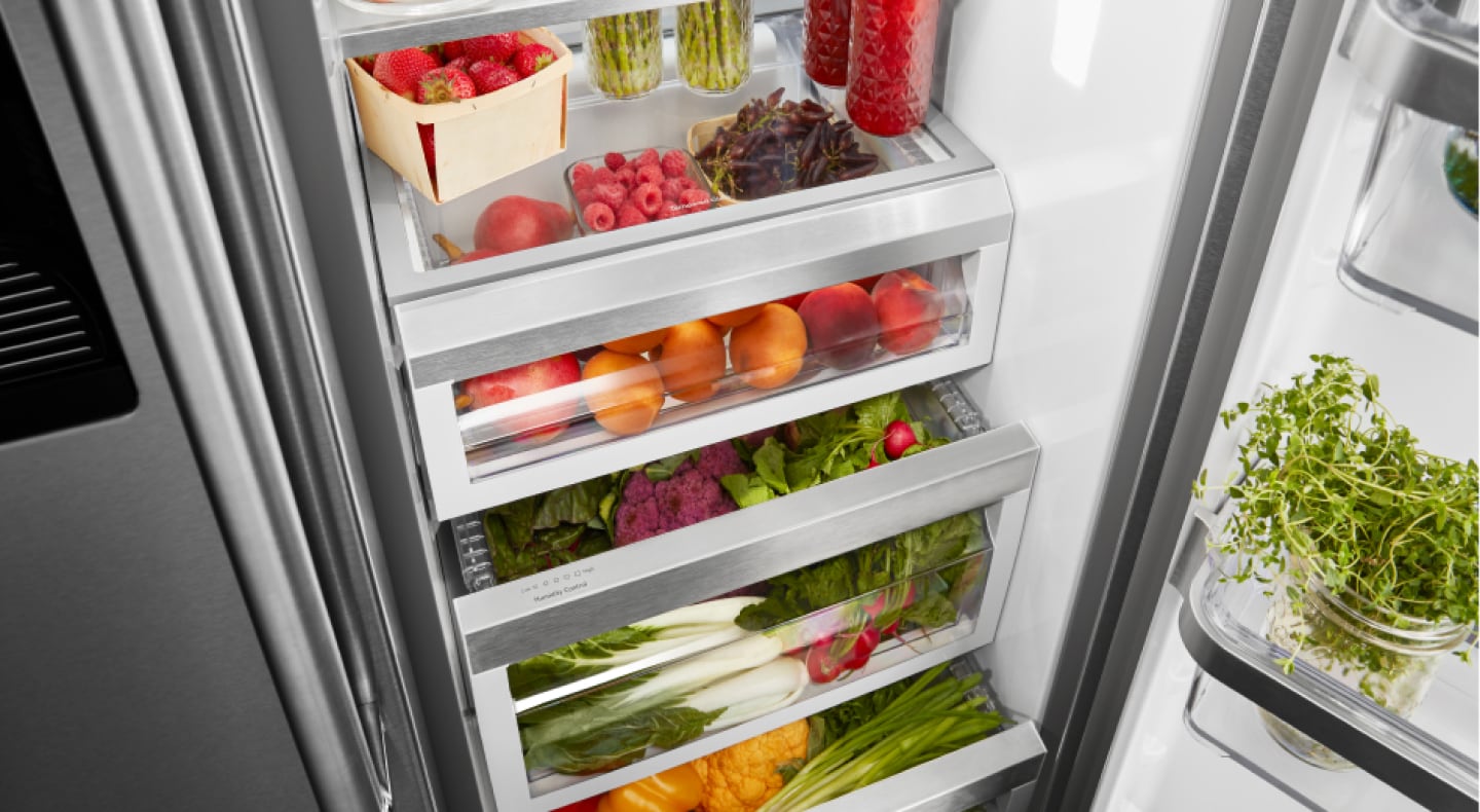 Birds-eye view of fresh product organized inside of a refrigerator Birds-eye view of fresh product organized inside of a refrigerator