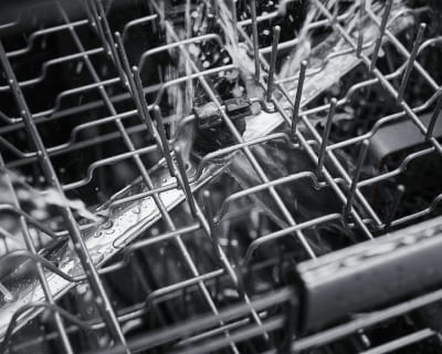 Closeup on interior top dishwasher rack