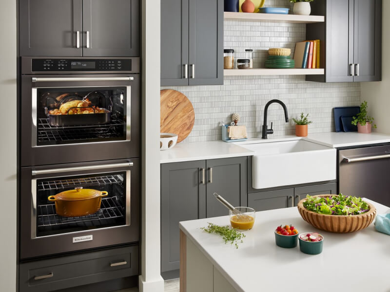 KitchenAid® double wall oven with a turkey and dutch oven inside