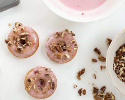 Cornbread doughnuts with cranberry glaze and pecans