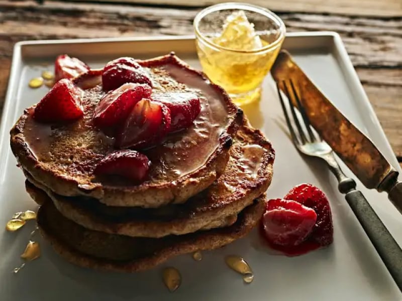 Pancakes topped with strawberries