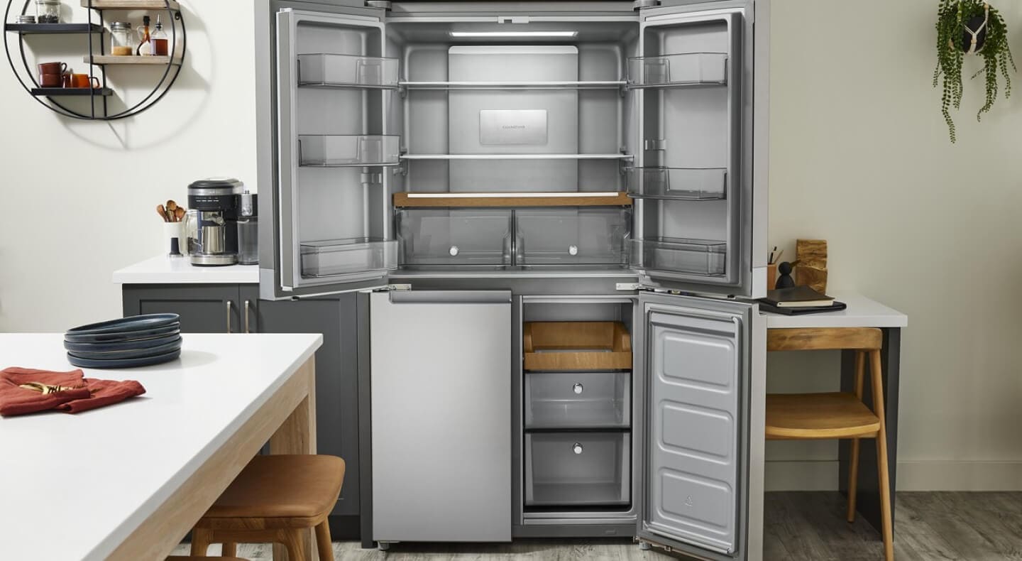 Title Needed A KitchenAid® 4-door refrigerator with three of its doors open to show the interior