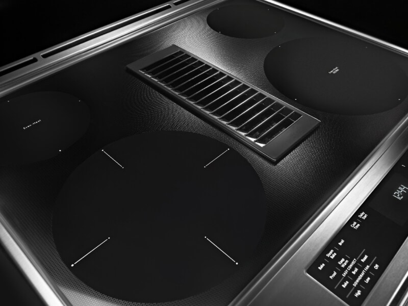 Cooktop surface of a downdraft electric range