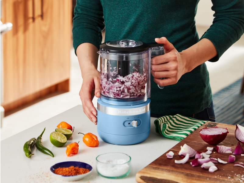 A cordless food chopper from KitchenAid brand.