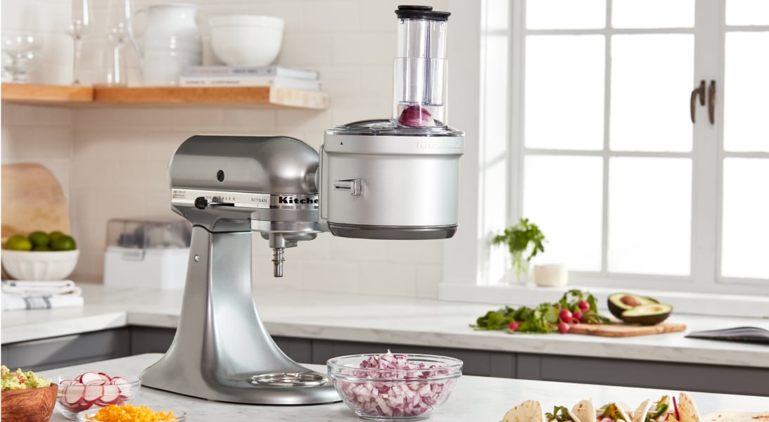 A dicing attachment and bowl of diced red onions.
