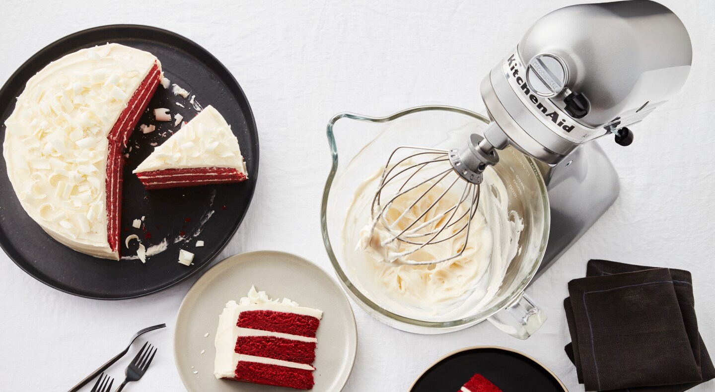 A stand mixer used to make a cake A stand mixer used to make a cake