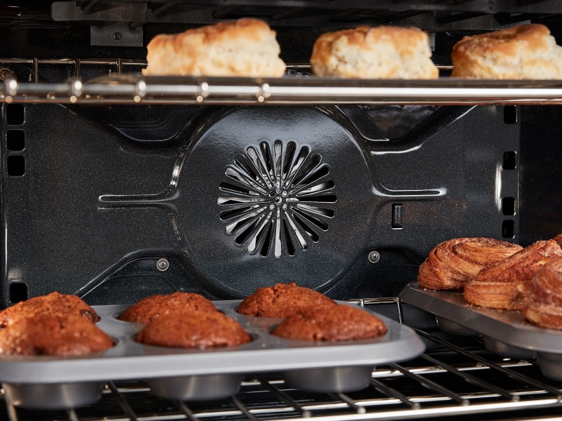 A convection fan pushing air to bake food