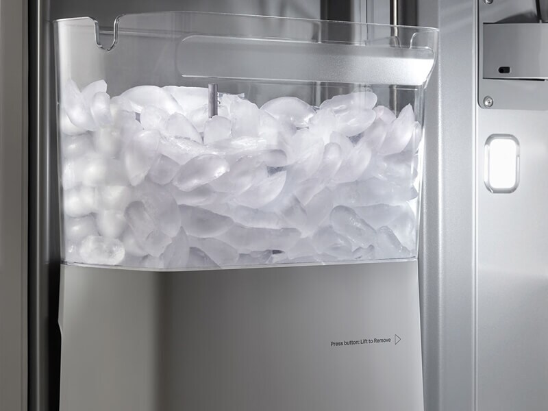 In-door ice maker bin full of ice