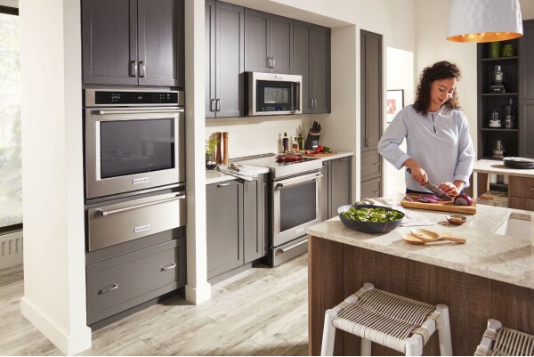 Person preparing food at a kitchen island