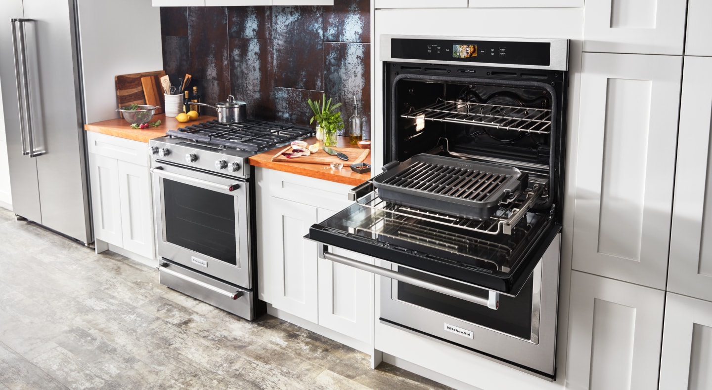 A double wall oven with the top open