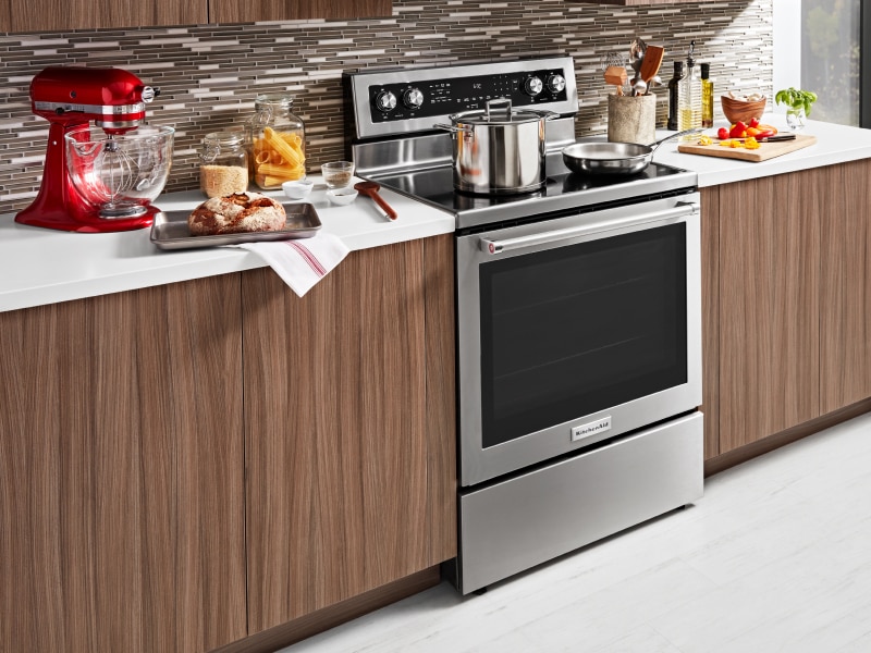 KitchenAid® electric range with a pot and skillet on top