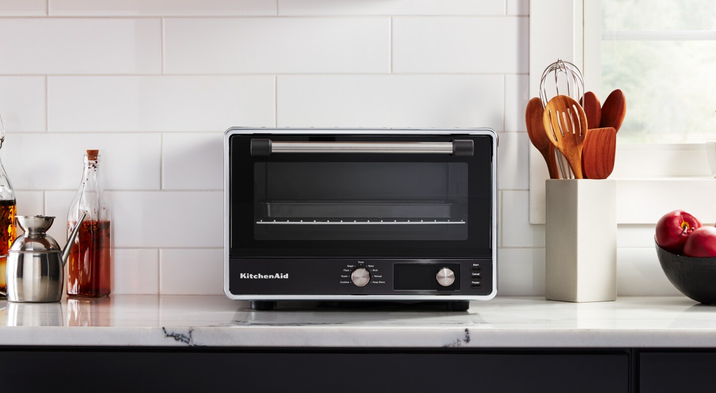 KitchenAid® countertop oven on white counter KitchenAid® countertop oven on white counter