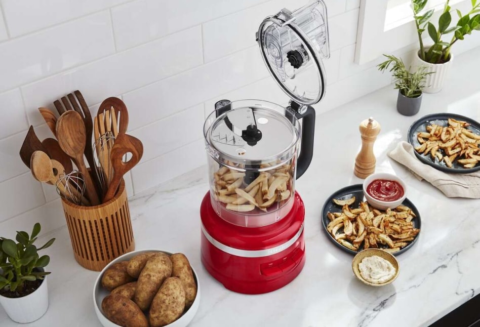 KitchenAid® Food Processor with sliced potatoes on a counter KitchenAid® Food Processor with sliced potatoes on a counter