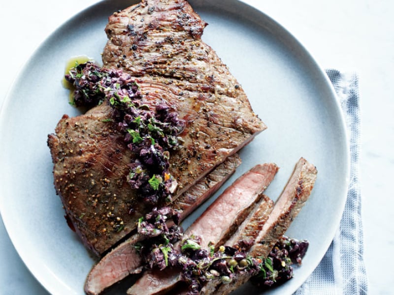 Cooked, sliced steak on a plate Cooked, sliced steak on a plate