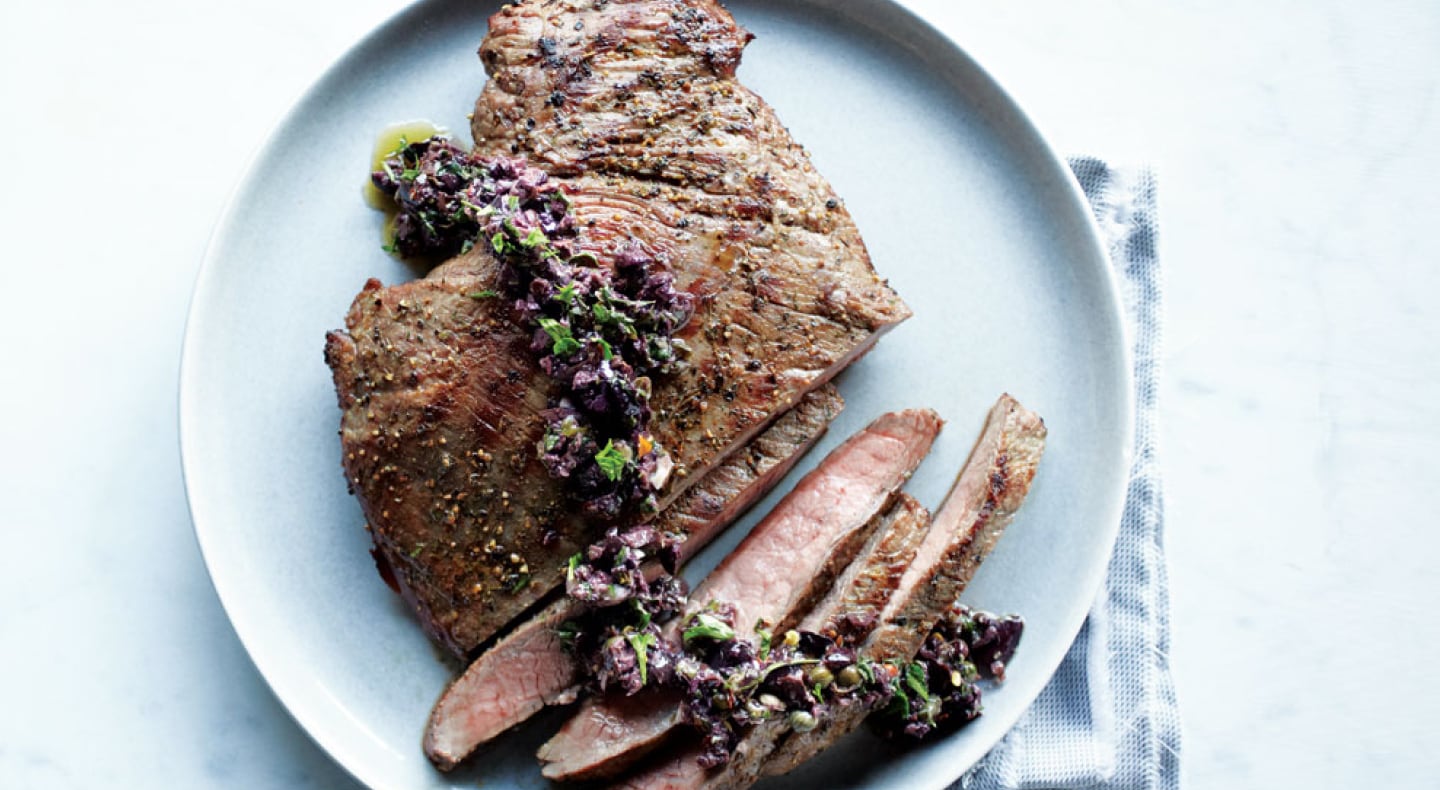 Cooked, sliced steak on a plate Cooked, sliced steak on a plate