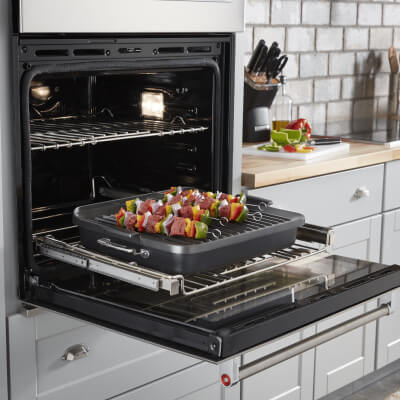 Kabobs on a grill pan in a KitchenAid® oven