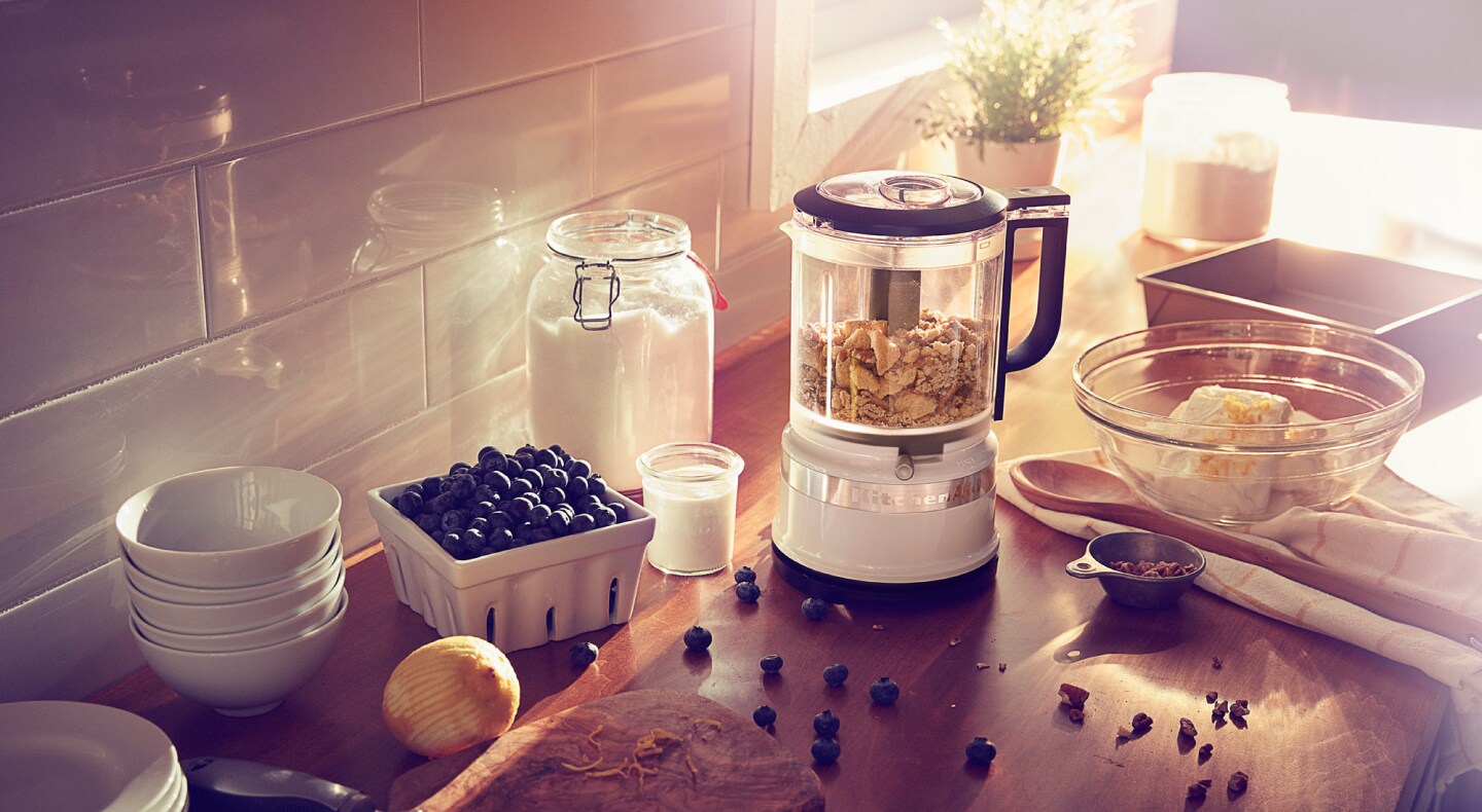 KitchenAid® food chopper on countertop with blueberries and cream cheese KitchenAid® food chopper on countertop with blueberries and cream cheese