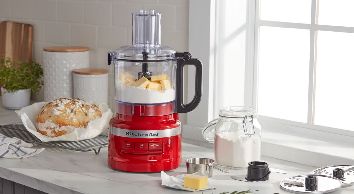 KitchenAid® food processor with bread ingredients on countertop KitchenAid® food processor with bread ingredients on countertop