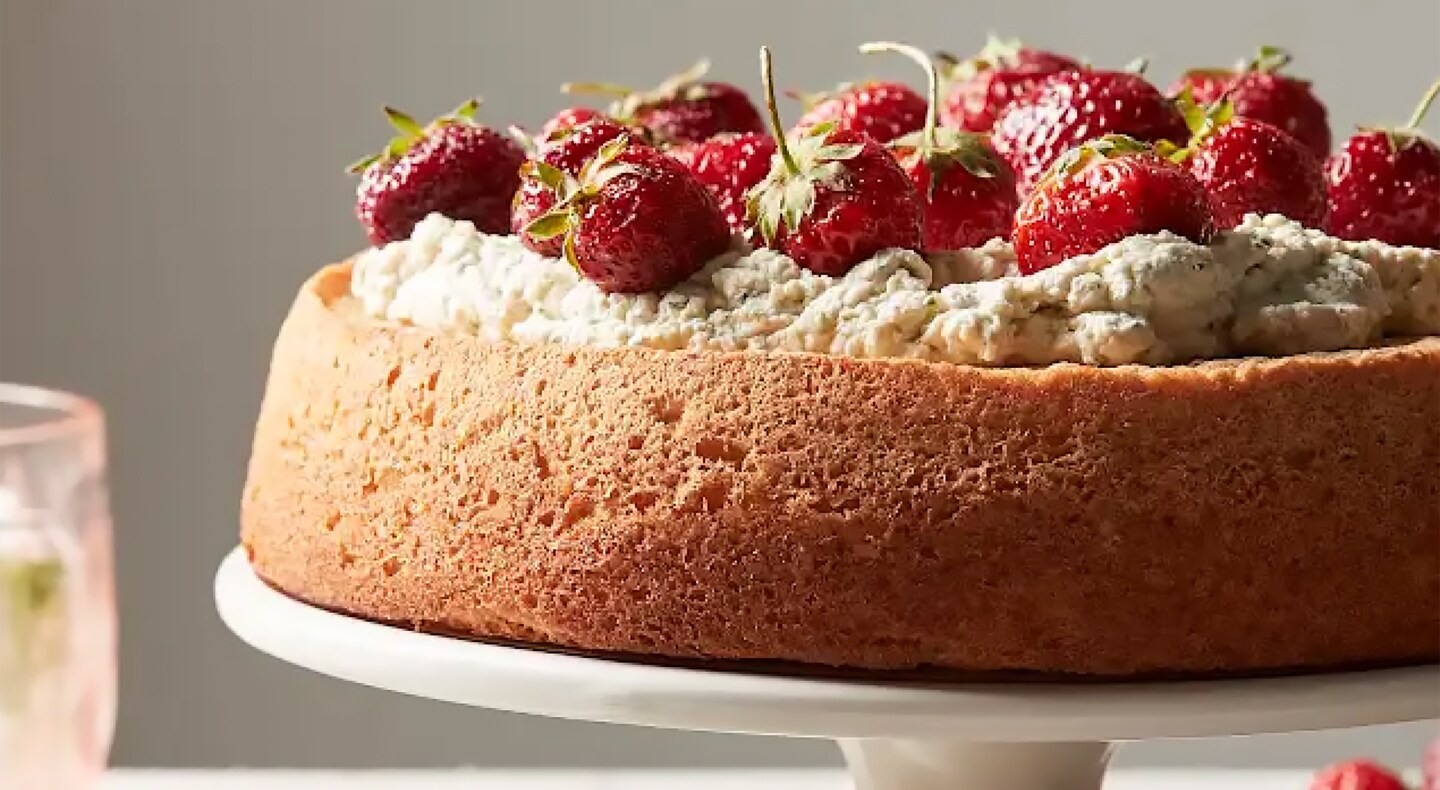 Chiffon cake with strawberries on top Chiffon cake with strawberries on top