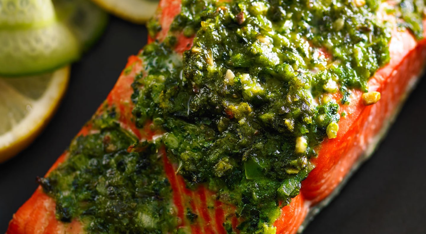 Roasted salmon topped with homemade pesto Roasted salmon topped with homemade pesto