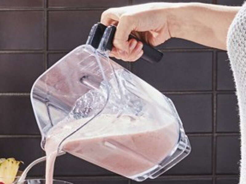 Frosé being poured from a KitchenAid® blender