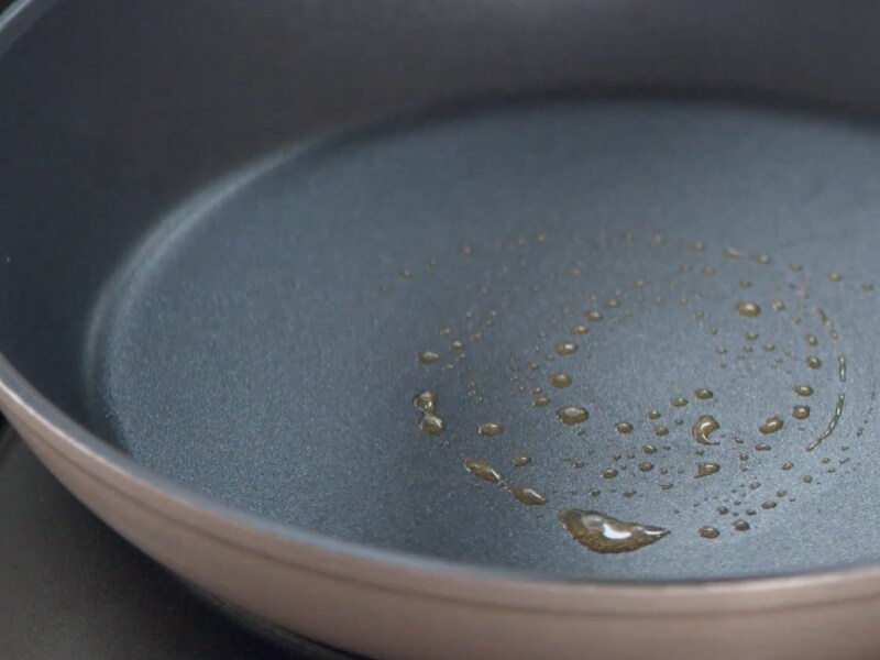 Skillet sprayed with cooking oil and heating