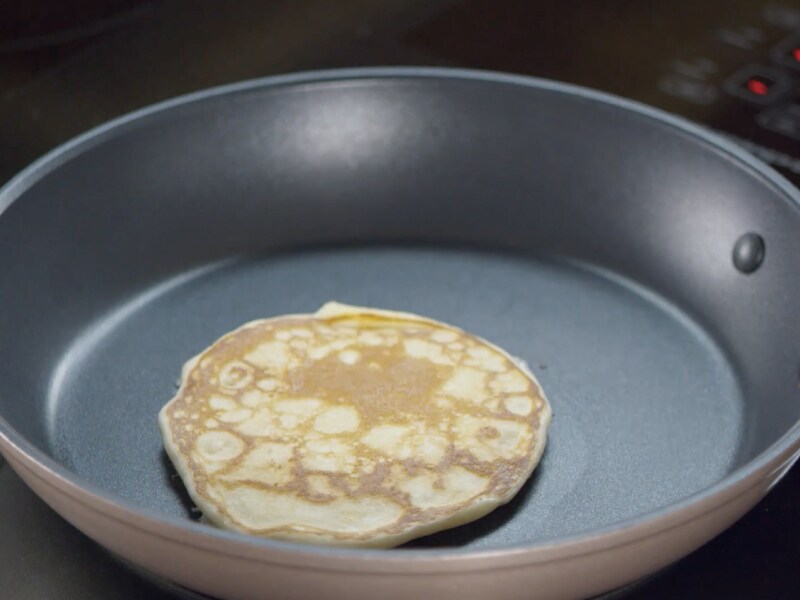 Cooking pancake inside of a skillet 
