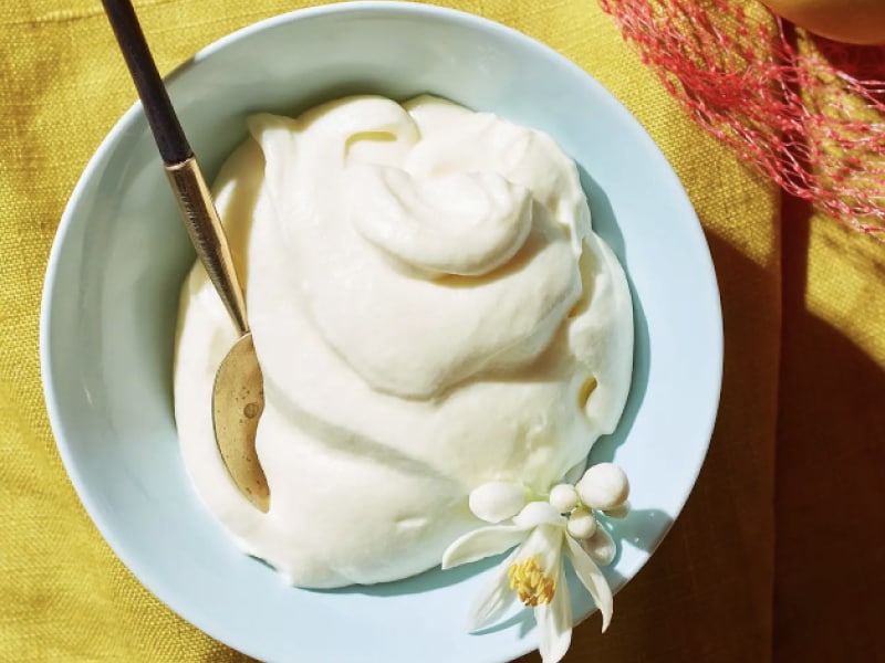 A bowl of lemon mousse.
