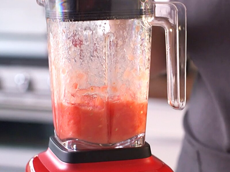 A mixture of blended ingredients in a blender