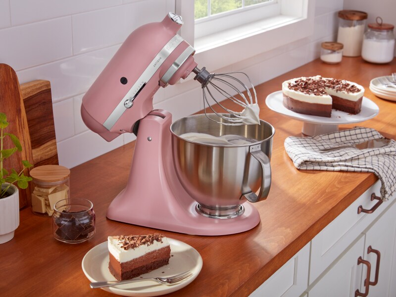 Homemade whipped cream in a pink KitchenAid® stand mixer Homemade whipped cream in a pink KitchenAid® stand mixer