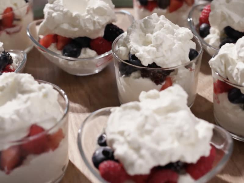 Fruit parfait topped with whipped cream Fruit parfait topped with whipped cream