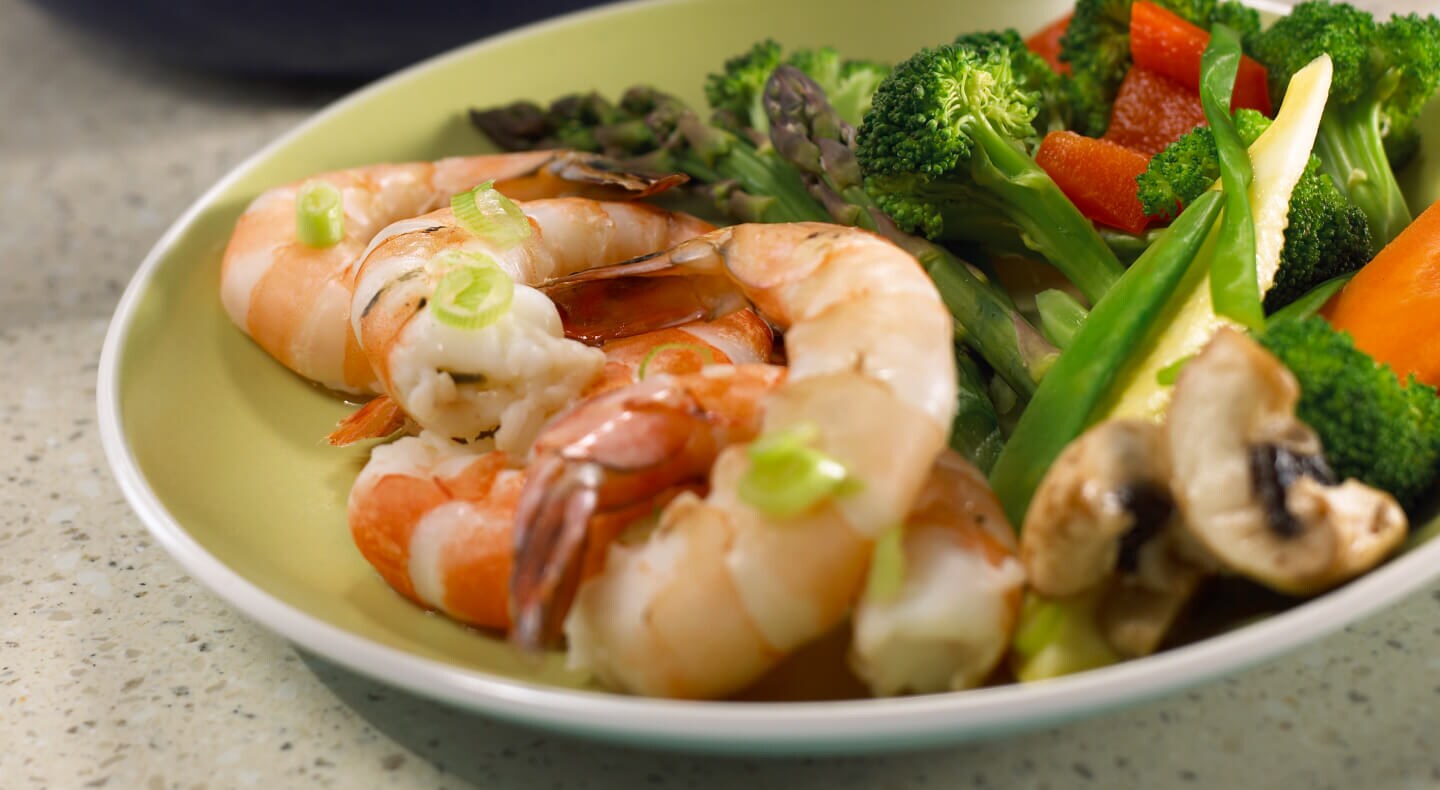 Shrimp and veggies on a plate Shrimp and veggies on a plate